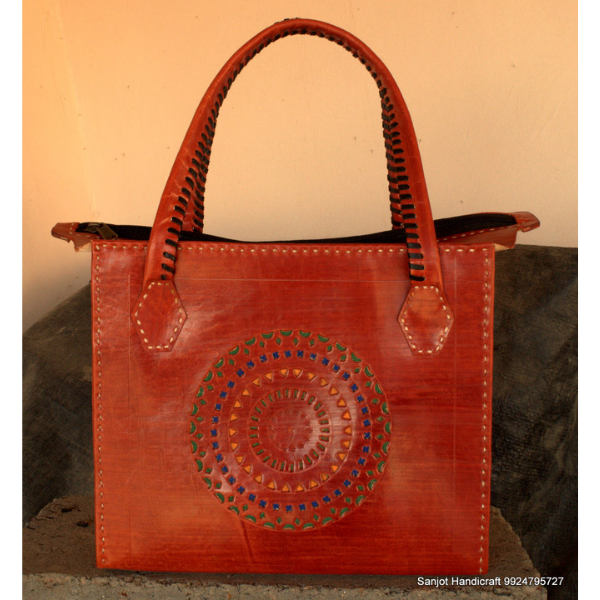 Leather handbag with punch work